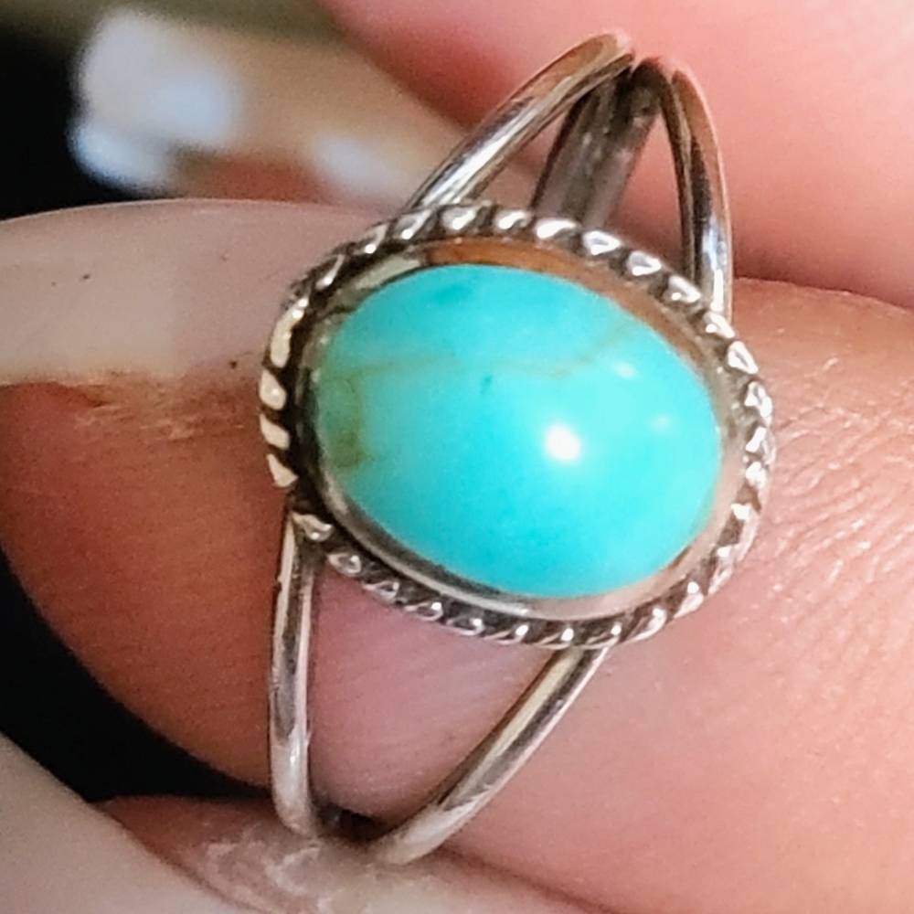 Turquoise stone set in SILVER size 6